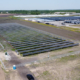 Daytime aerial view of a solar farm at Valmont Industries