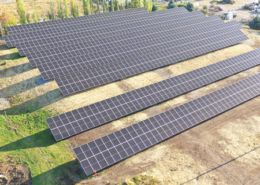 Daytime aerial view of a solar farm in Missoula Montana