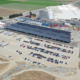 Daytime aerial view of a solar carport at Taylor Farms