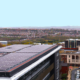 Daytime view of solar panels on the roof of a parking structure in the United Kingdom