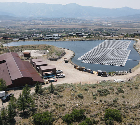 Daytime aerial view of a floating solar energy farm at Mountain Water Special Service District in Utah