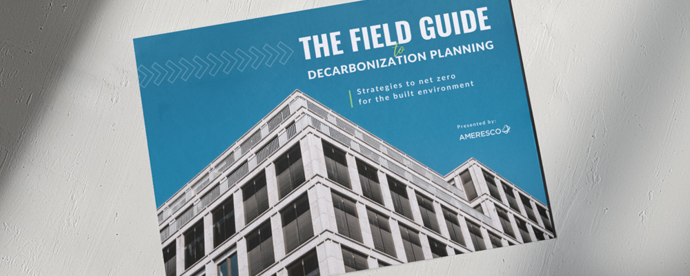 Screenshot of the cover of The Field Guide to Decarbonization Planning Strategies to net zero for the built environment Presented by Ameresco