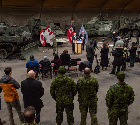 Officials announce energy infrastructure upgrades at an event at Canadian Forces Base Edmonton