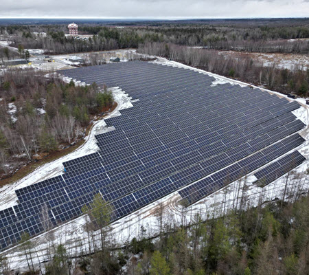 Daytime aerial view of solar panels at the 5th Canadian Division Support Base in New Brunswick