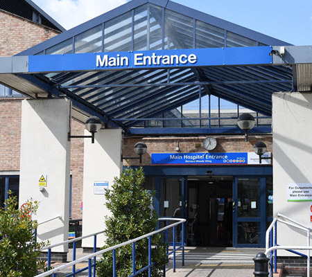 Daytime view of the entrance of Kingston Hospital in the United Kingdom