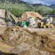 Daytime view of a rock crushing operation in Boulder