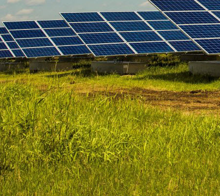 Daytime view of a municipal solar farm on a capped landfill in Sudbury.
