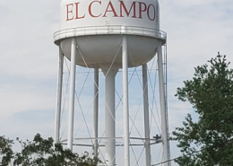 Daytime view of an El Campo municipal water system tower