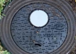 Daytime view of a smart municipal water meter cover in Mesquite Texas
