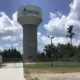 Daytime view of a municipal water tower in Conroe