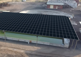 Daytime aerial view of a solar canopy at a water treatment plant in Pendleton