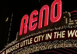 Night time view of the Reno welcome sign with the words The Biggest Little City in the World