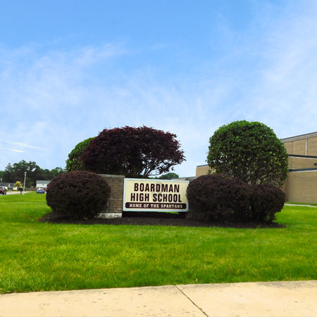 boardman-school-district-efficiency-upgrades-case-study-featured-image Daytime view of a sign outside Boardman High School reading Home of the Spartans