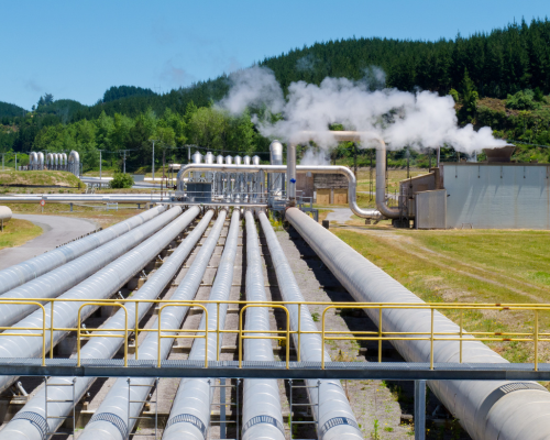 Daytime view of a geothermal power plant generating geothermal electricity
