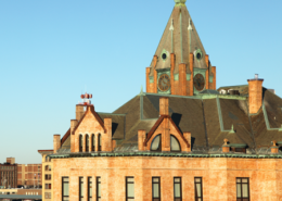 Daytime view of the roofline of Brockton City Hall