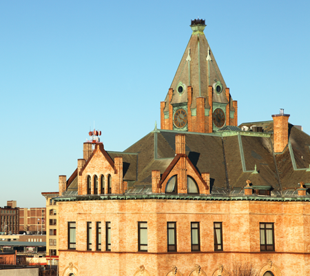 Daytime view of the roofline of Brockton City Hall