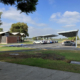 Daytime exterior view of K-12 school solar car ports in Orange Unified School District