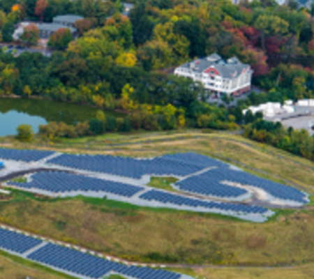 Aerial view of a landfill solar farm in the City of Lowell